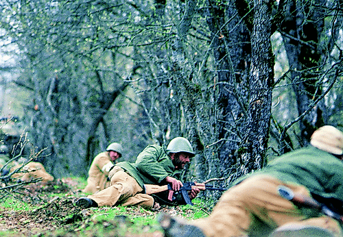 Armenian soldiers in Karabakh, 1994, wearing Soviet Army combat helmets and wielding AK-74 assault rifles. Armdesant, CC BY-SA 3.0, via Wikimedia Commons