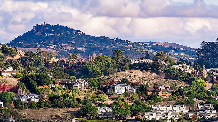 Aerial view of residential neighborhood with scattered houses build on hill slopes, Mill Valley, North San Francisco Bay Area, California