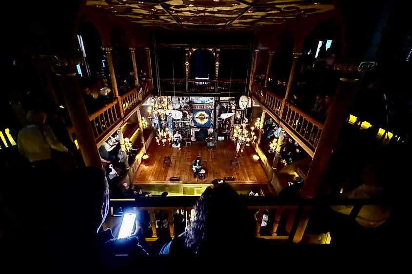 Sam Wanamaker Playhouse, settling down in our seats. Image credit: Bryan Dearsley
