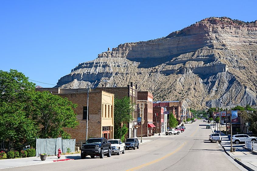 The beautiful main street of Helper, Utah, with gorgeous backdrop of the mountains