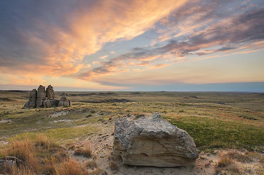 USA, Montana. Sunset over sandstone rock formations and prairie of Medicine Rocks State Park.