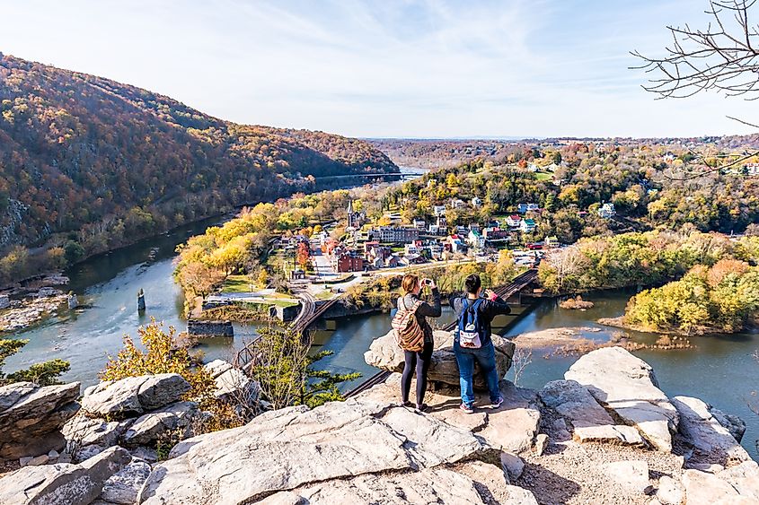 Hikers looking down at Harper's Ferry, West Virginia, via Andriy Blokhin / Shutterstock.com