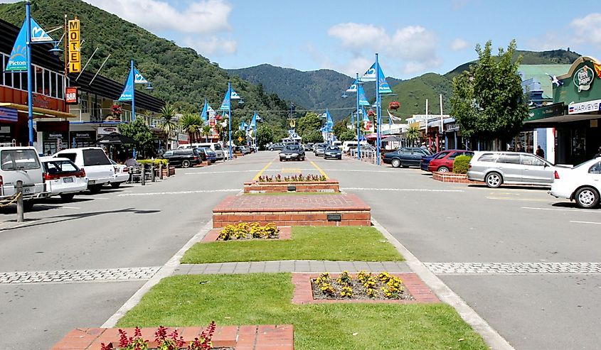 Looking down the main street towards distant wooded slopes in Picton, New Zealand.