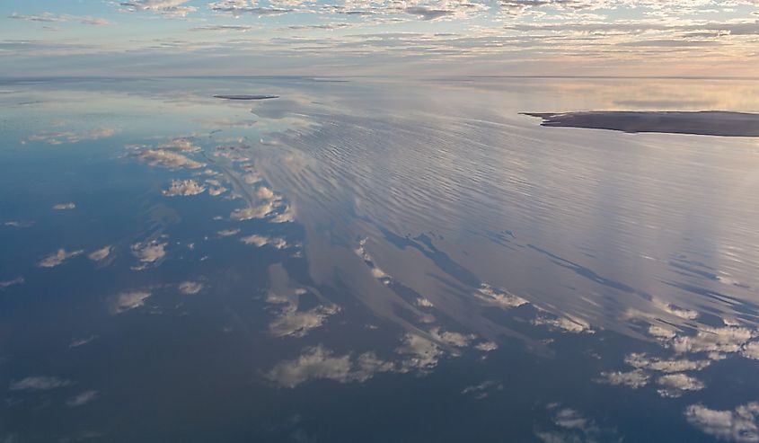Lake Eyre salt lake filling with water after flooding rains.