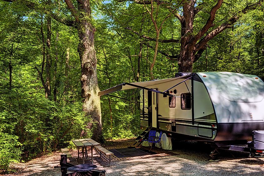 Travel trailer camping in the woods at Starved Rock State Park, Illinois
