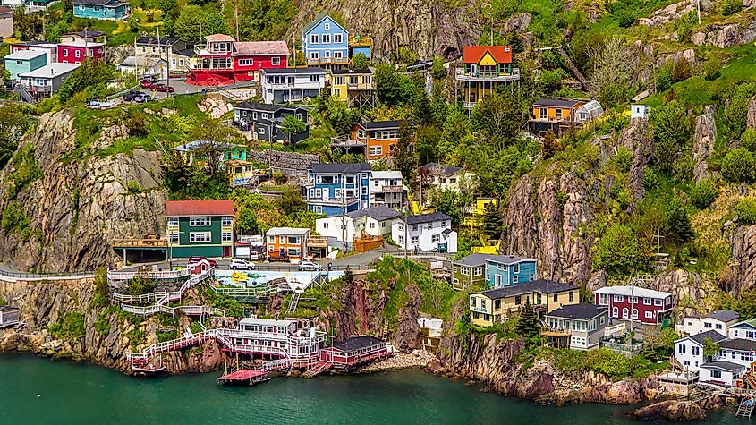 Aerial view of beautiful colorful houses built on the rocky slope of the Signal Hill in St. John's Newfoundland, Canada