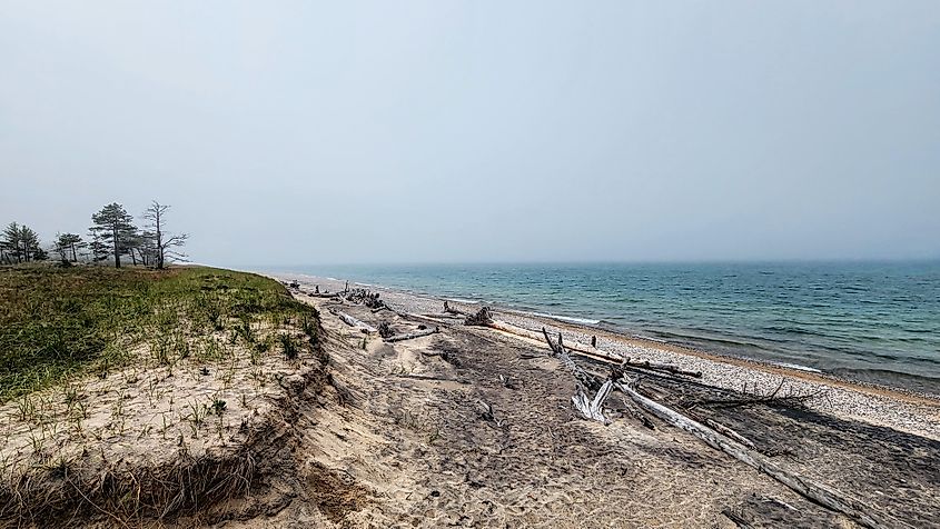 Foggy, wooded Lake Superior shoreline in Michigan's Upper Peninsula.