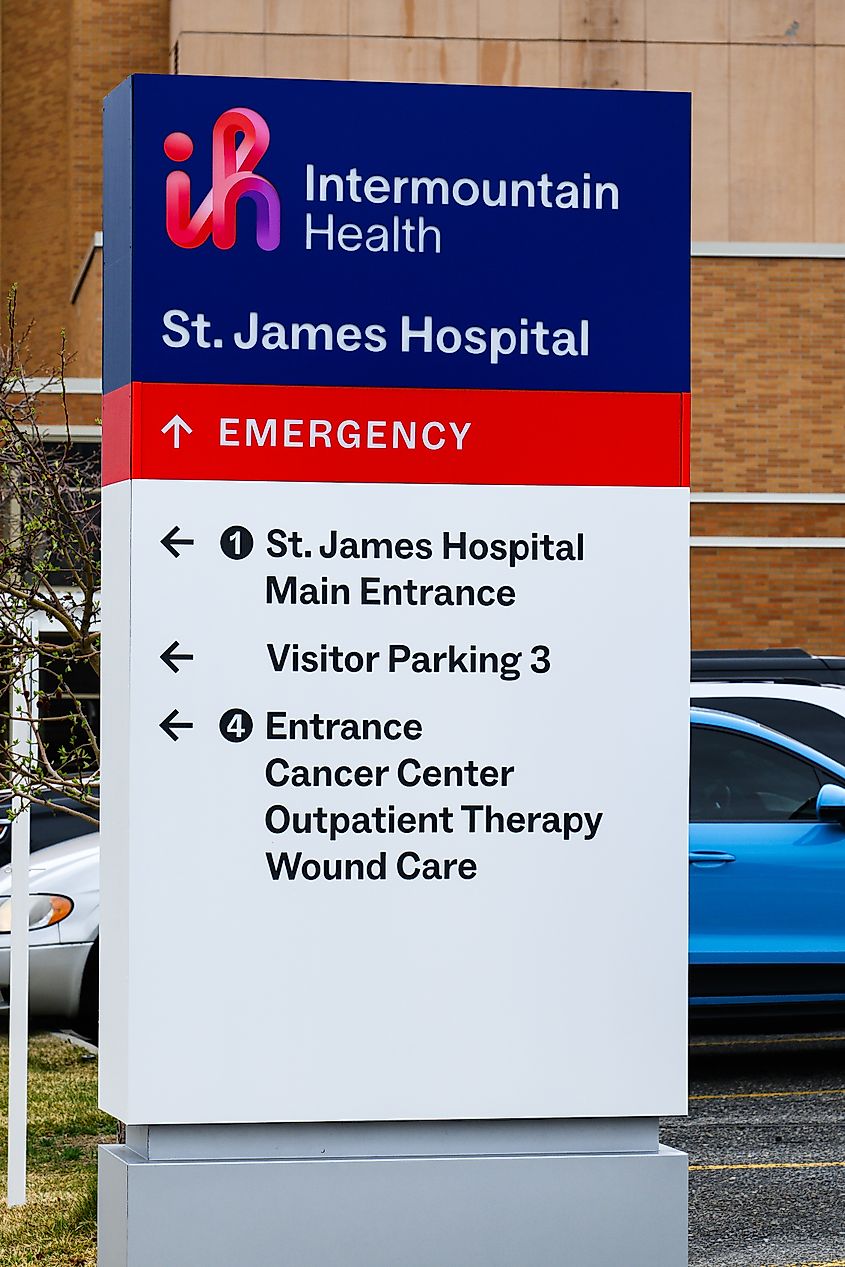 Intermountain Health St James Hospital sign with logo and directions.