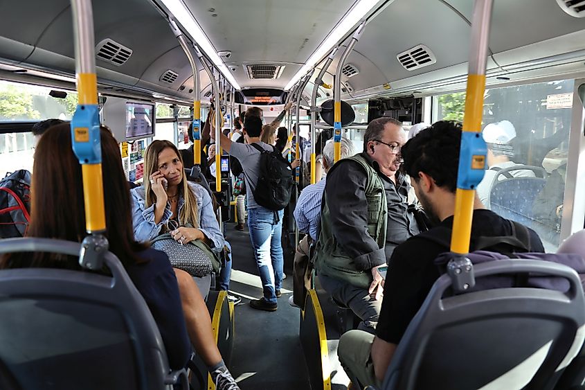 People ride a public transportation city bus in Tel Aviv, Israel.