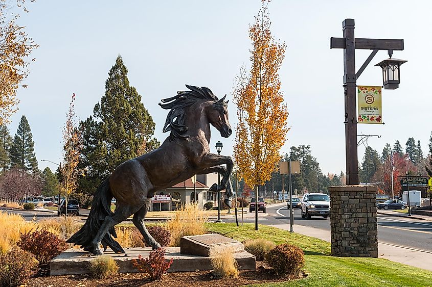 A bronze sculpture of a ramping horse on one of the main streets of Sisters, Oregon, via Esteban Martinena Guerrer / Shutterstock.com