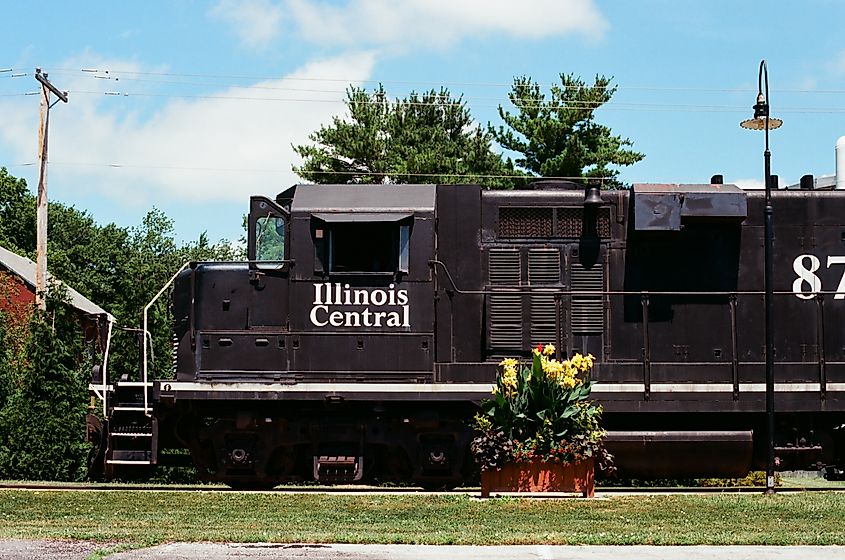 Editorial Photo Credit: Logan Bush via Shutterstock. Monticello, Illinois - July 24, 2023: An Illinois Central train car at the Monticello Railway Museum Wabash Depot.