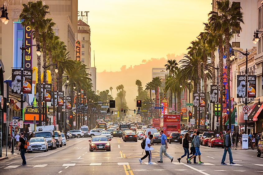 Hollywood Boulevard, a popular tourist area in Los Angeles, at dusk. 