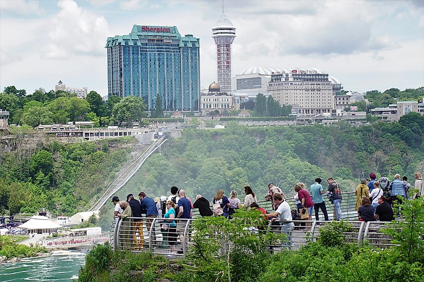 Tourists gathered at an observation area on Luna Island in Niagara Falls State Park