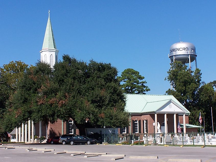 St. Peters Catholic church next to the town's water tower.