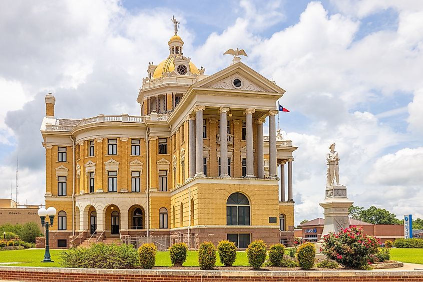 Marshall, Texas, USA - June 28, 2021: The Harrison County Courthouse and its confederate memorial.