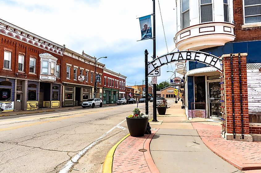 Historic downtown street scene beneath the Elizabeth archway in Elizabeth, Illinois
