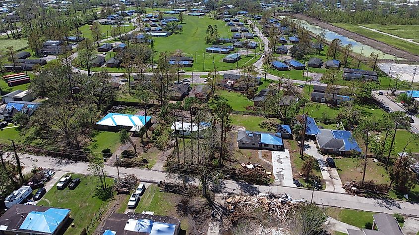 An aerial view of the blue tarps on roofs in United States