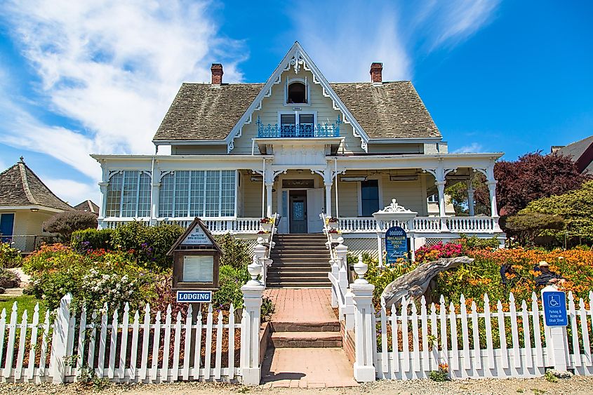 Beautiful classic victorian house in Mendocino, via Radoslaw Lecyk / Shutterstock.com