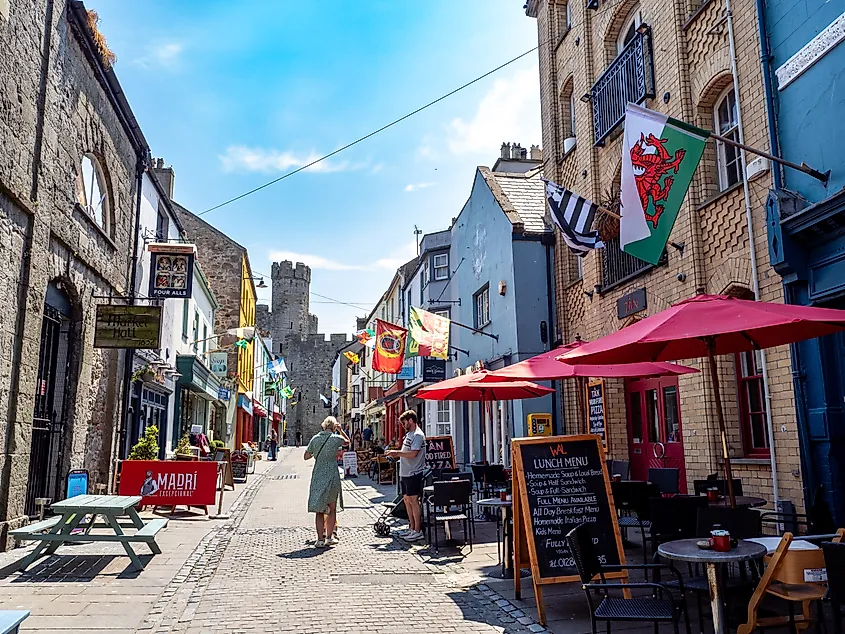 A pretty street with local businesses in Caernarfon, Wales