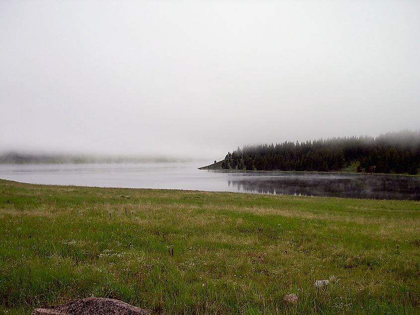 Sheridan Lake covered in winter fog, Wyoming, USA