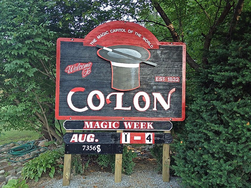 Welcome sign for Colon, Michigan, listing the dates for Magic Week. 