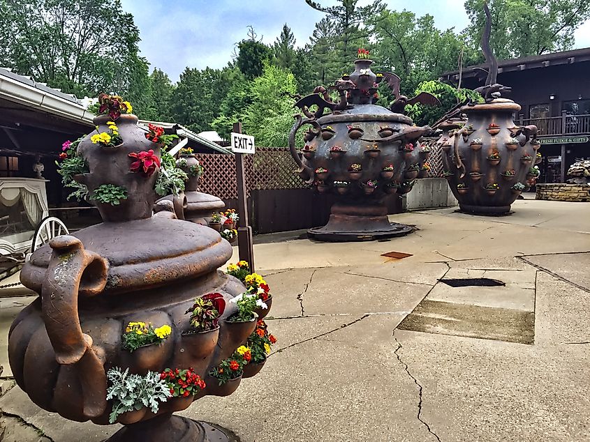 Wisconsin, USA: Elaborate copper planters with colorful flowers inside the House on the Rock, a popular tourist attraction in Iowa County.