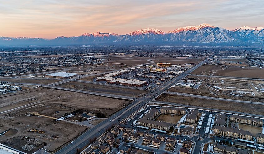Aerial photo of new shopping center in Herriman, Utah and view of Wasatch Mountain and Salt Lake City, Utah