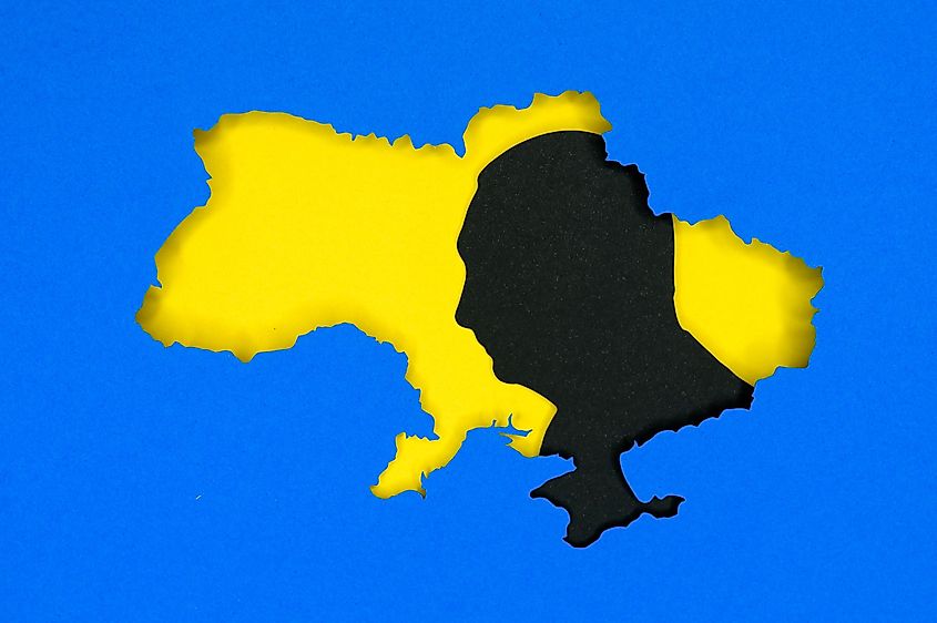 Silhouette of Putin over a map of Ukraine, symbolizing modern tension.