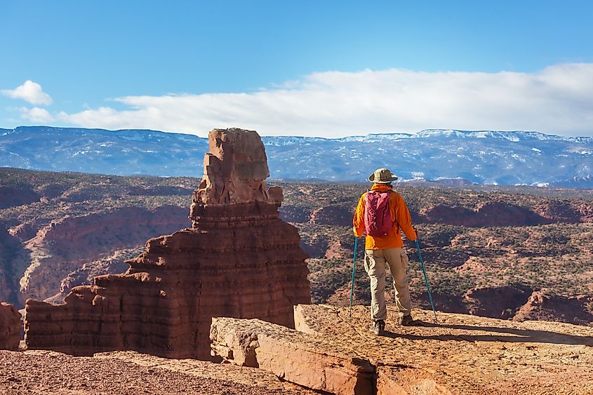 A person hiking in the Capitol Reef National Park, Utah.