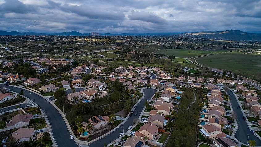 Above drone view of homes and neighborhoods in Temecula, Murrieta, Menifee in river side county California