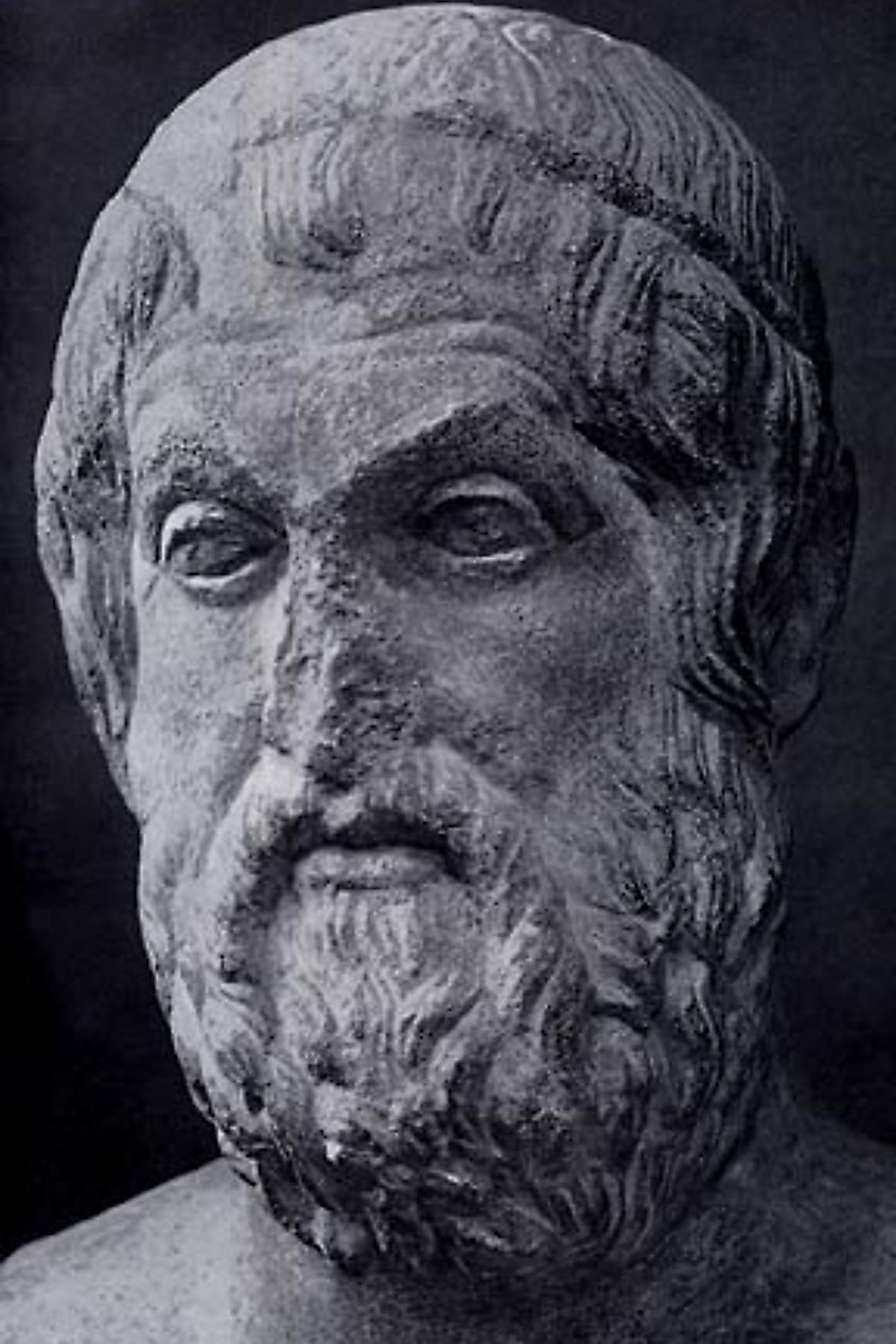 Crumbling statue of the face of philosopher Sophocles