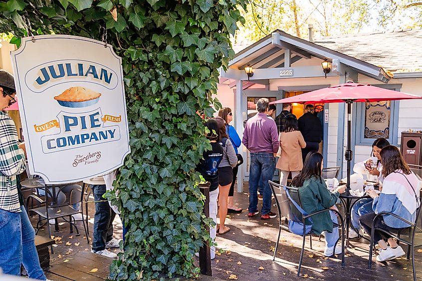 A line of customers queues out the door waiting to order at the Julian Pie Company