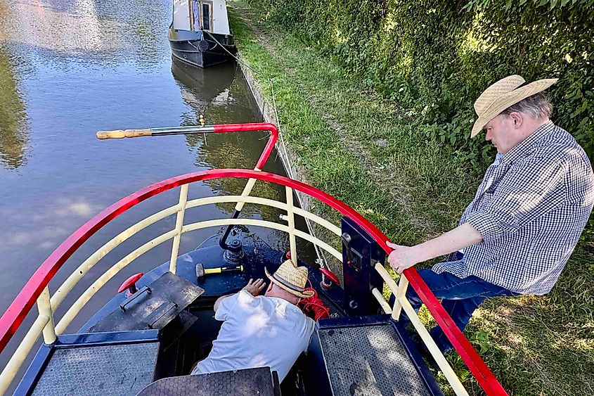 Skipper Toby in the hold clearing weeds. Image credit: Bryan Dearsley