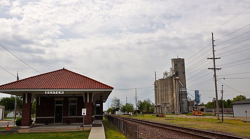 Visitor center and grain towers along the railroad tracks in Dexter, Missouri.