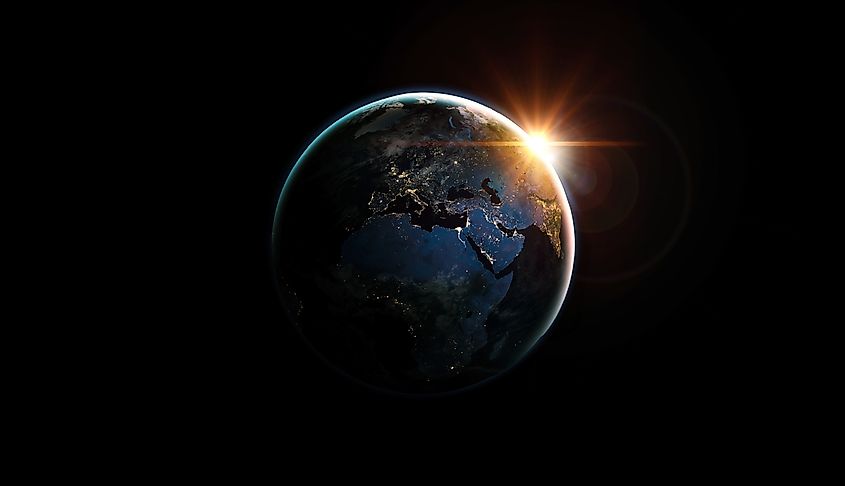Planet Earth against a deep-space background of stars, illustrating its motion through space.