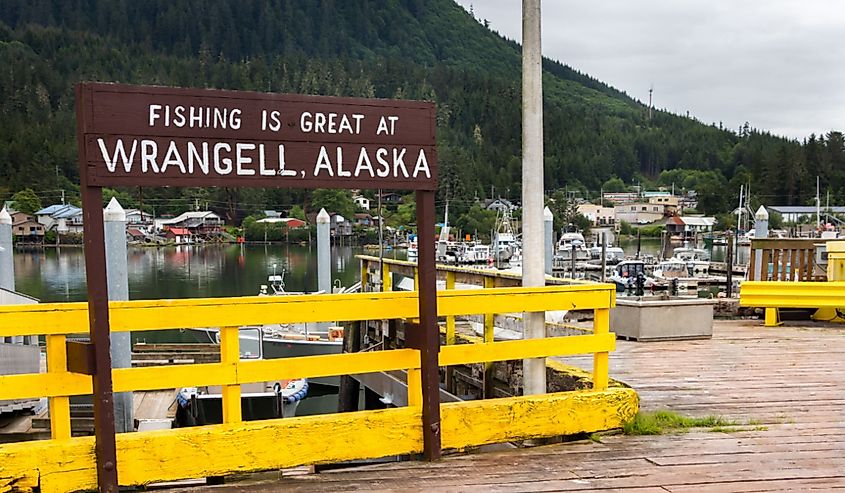 View of the welcome wooden board The Reliance Harbor in Wrangell, Alaska.