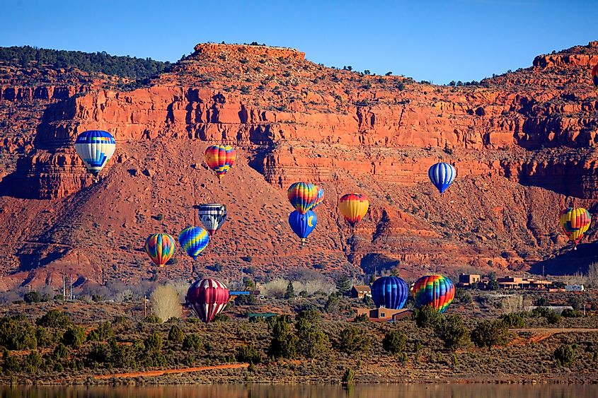 Hot air balloons fly over Kanab, Utah.