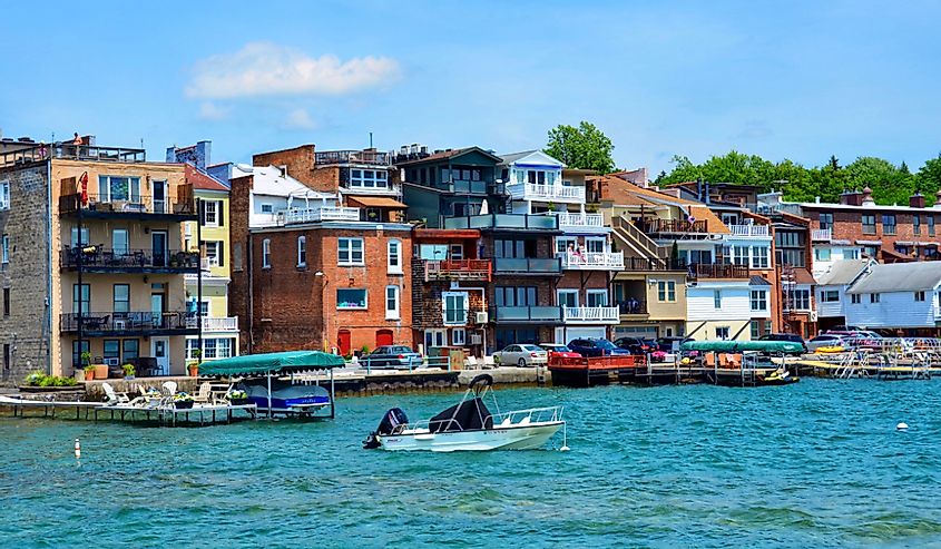 Boats in the water and waterfront homes at Skaneateles Lake in upstate New York.