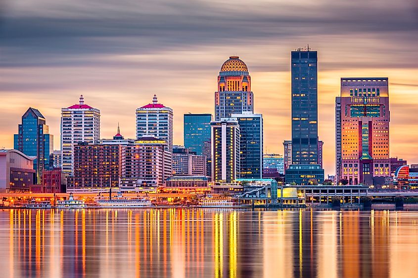 Louisville, Kentucky, downtown skyline on the Ohio River at dusk