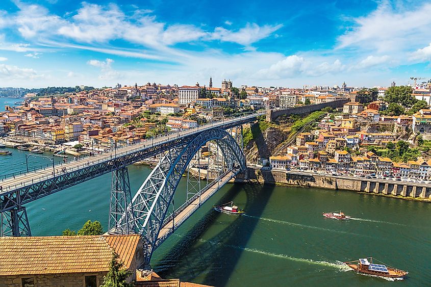 Panoramic aerial view of Dom Luis Bridge in Porto in a beautiful summer day, Portugal