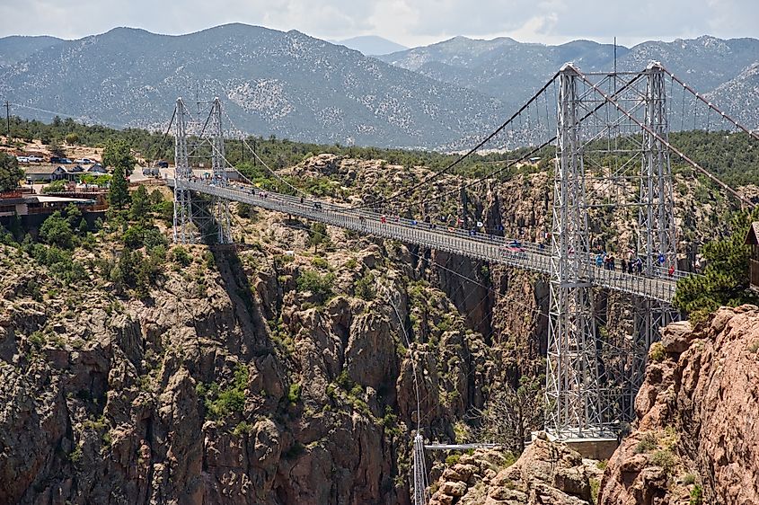 The Royal Gorge Bridge, one of the world's highest suspension bridges, crosses the canyon 956 feet above the Arkansas River and is considered one of the natural wonders of the world.