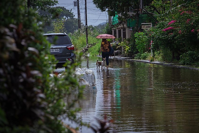 Iloilo, Philippines - October 30, 2022: Severe tropical storm Paeng or Nalgae brought flashfloods and rain to the country. View of a street flooded.