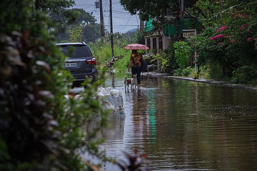 Iloilo, Philippines - October 30, 2022: Severe tropical storm Paeng or Nalgae brought flashfloods and rain to the country. View of a street flooded.