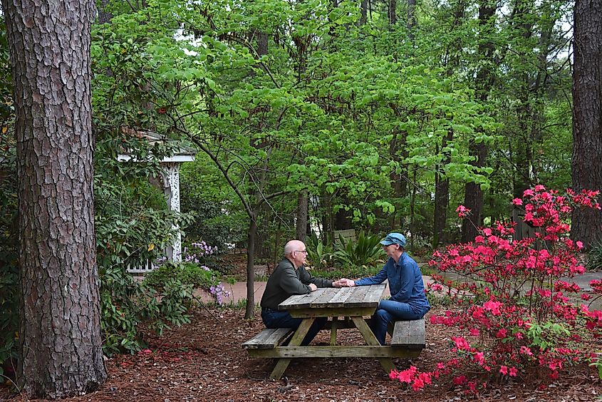 An elderly couple at the South Arkansas Arboretum. 