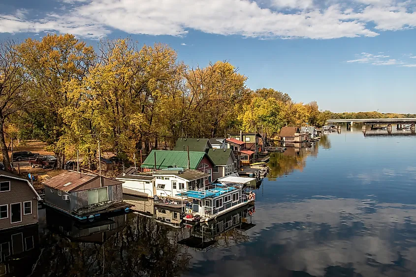 Winona, Minnesota: Houseboats on Latsch Island in the backwaters of the Mississippi River on an autumn morning, taken from the Latsch Island Bridge in Winona, Minnesota USA.