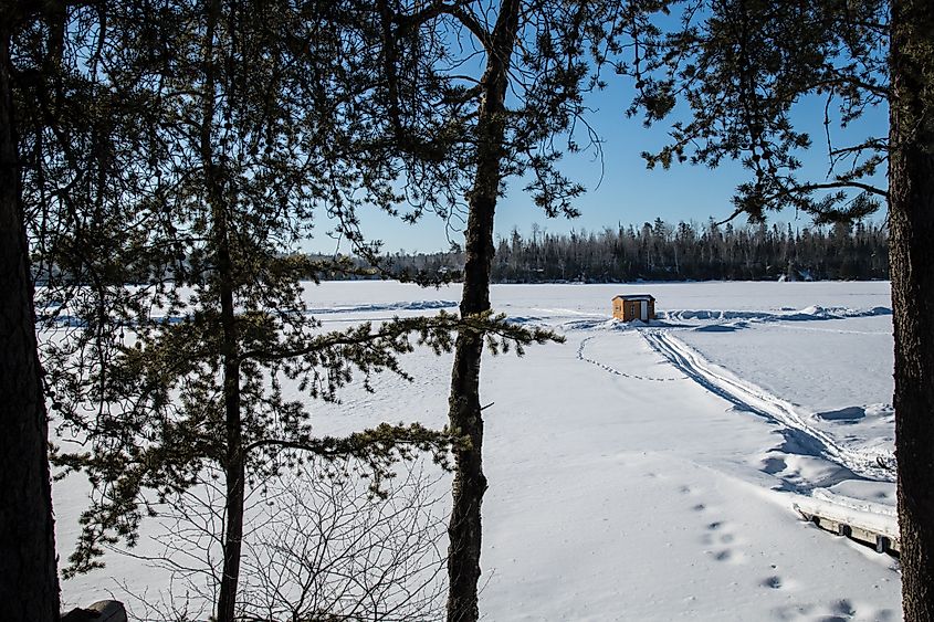 View of an ice shanty on Shagawa Lake in Ely, Minnesota, in the winter.