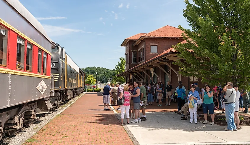 Tourists ready to board the Tygart Flyer in Elkins. Image credit Steve Heap via Shutterstock.