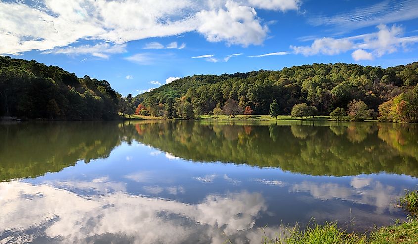 Lake Abbott under a cloud-filled sky in Autumn in Bedford, Virginia.