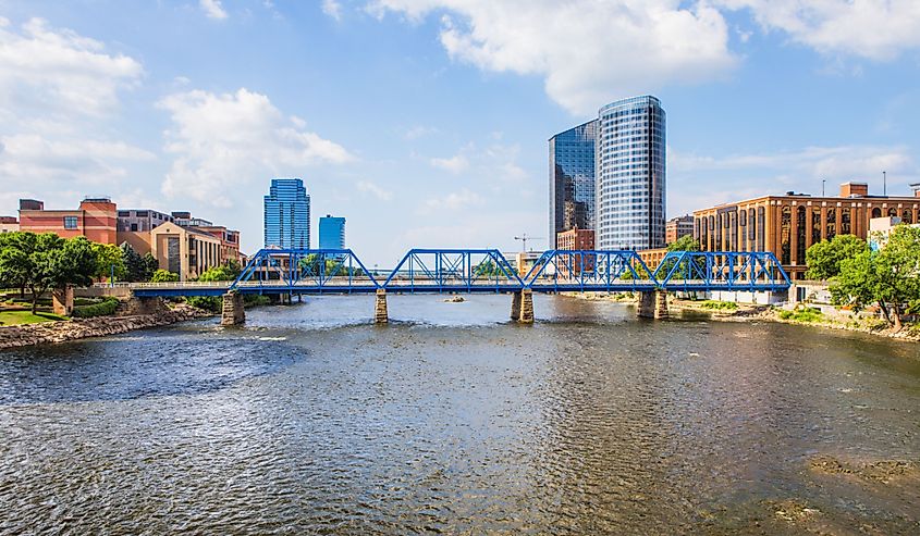 Downtown Grand Rapids Michigan view from the Grand River with bridge and cityscape