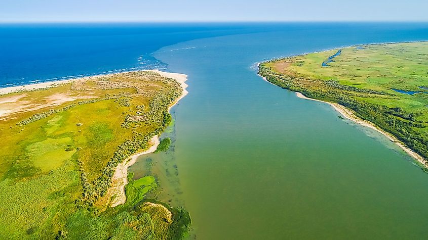 Aerial view of the Danube River merging with the Black Sea